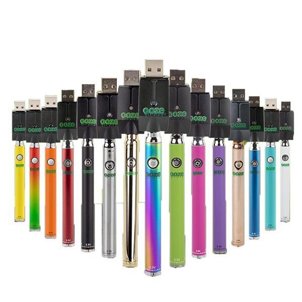 Line up of several different colorways of the Ooze Slim Twist Pen Battery with usb charger
